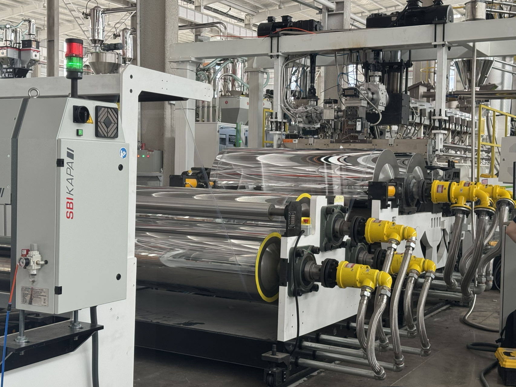 Ligne d'extrusion de films et de feuilles décoratifs pour meubles en plastique PETG/GAG | Fournisseur de machines d'extrudeuse JWELL